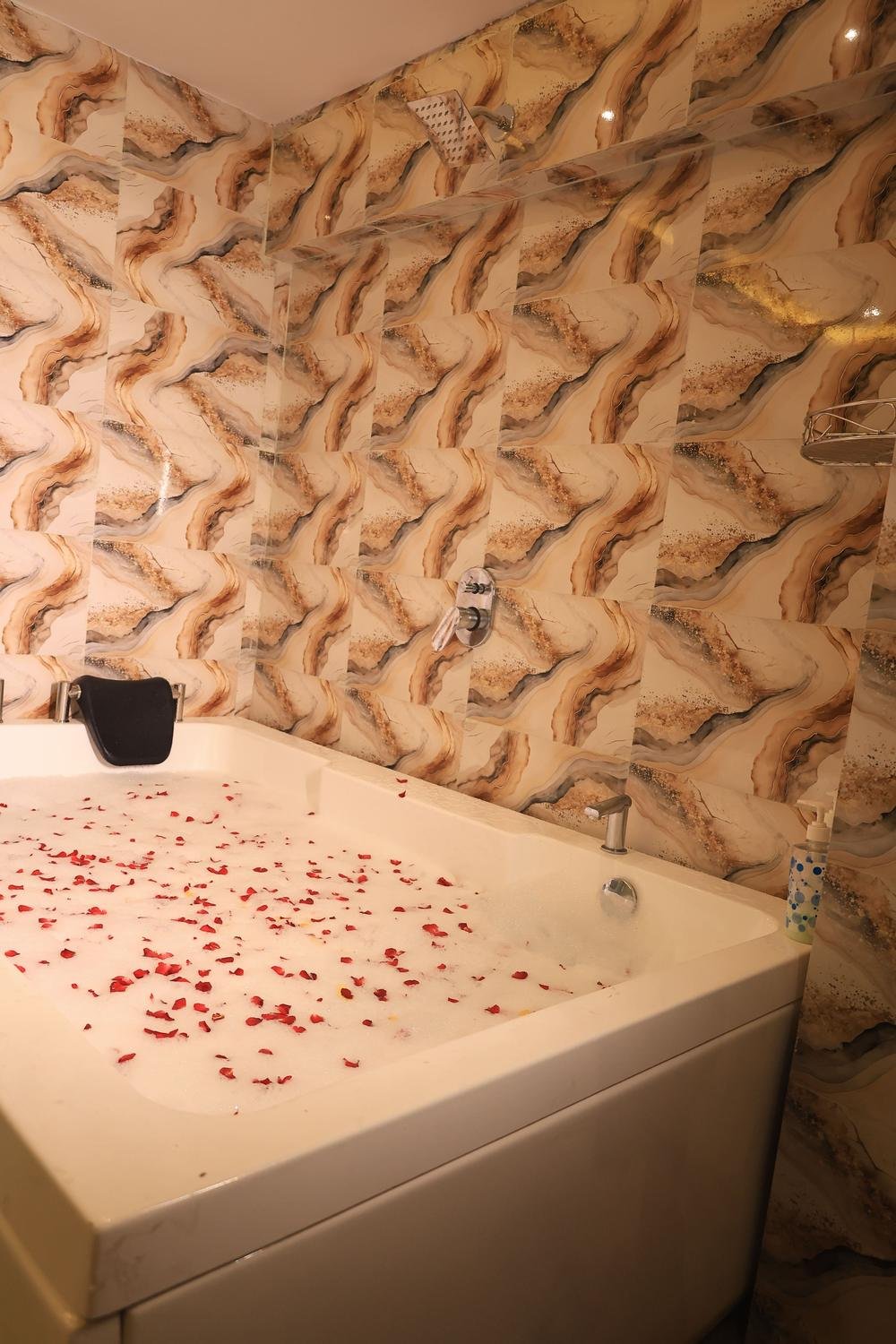 Private jacuzzi with rose petals