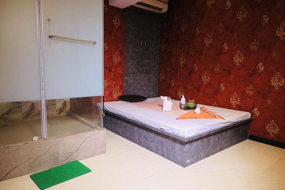 Massage room with rain shower